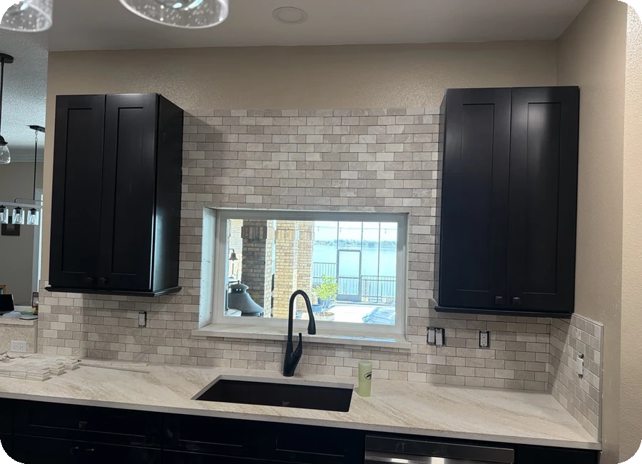 Natural stone kitchen backsplash tile installation with waterfront view — Tampa Bay